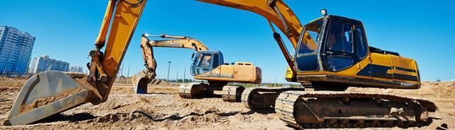 Excavators digging on a job site
